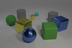 Input scene with nine objects, overlapping shapes, and mixed materials